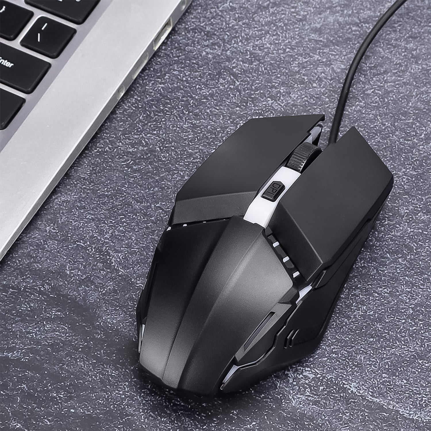 Hand comfortably gripping the ergonomic Wired Gaming Mouse during use.