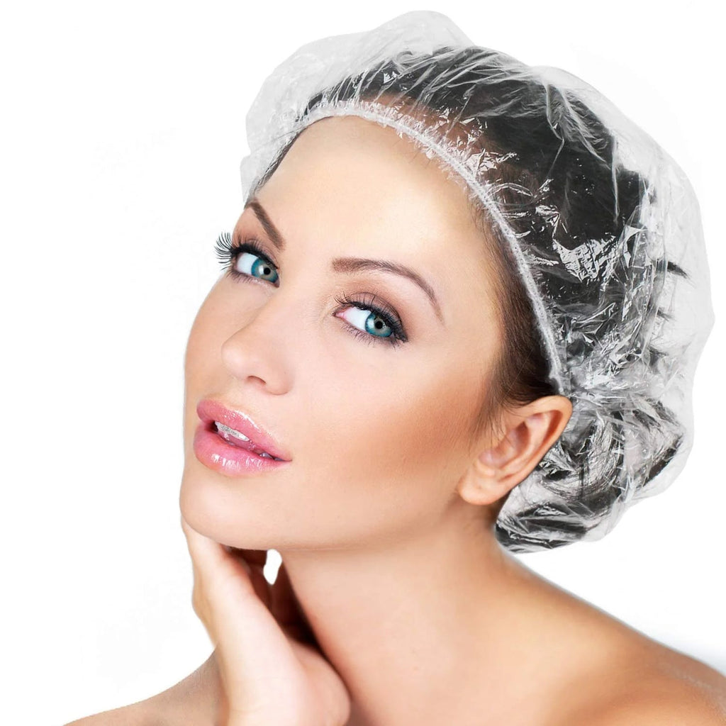A person wearing a VelvaBloom disposable shower cap, demonstrating effective hair protection.
