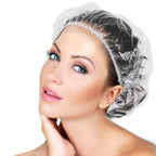 A person wearing a VelvaBloom disposable shower cap, demonstrating effective hair protection.