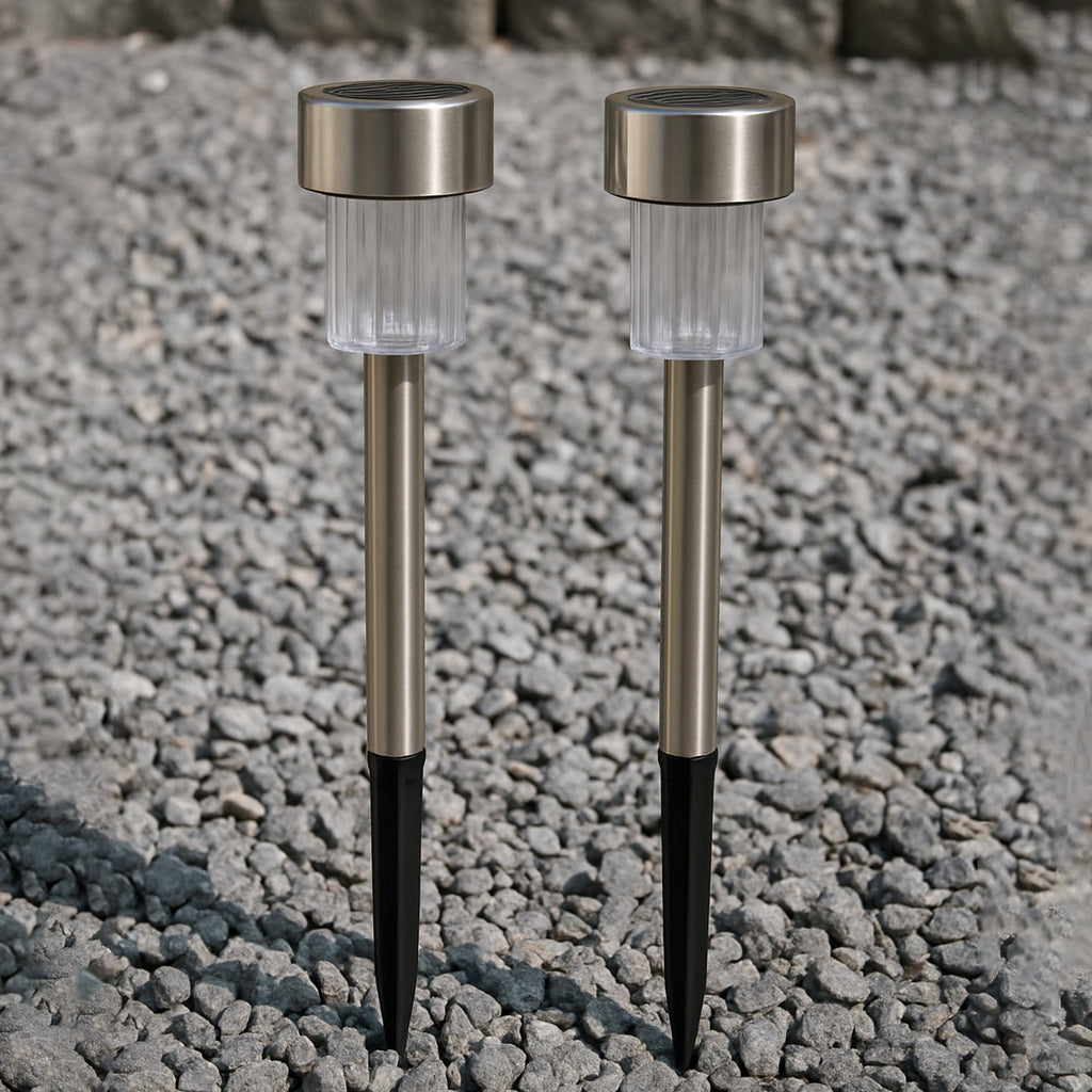 Weatherproof solar path light standing in a garden with green foliage