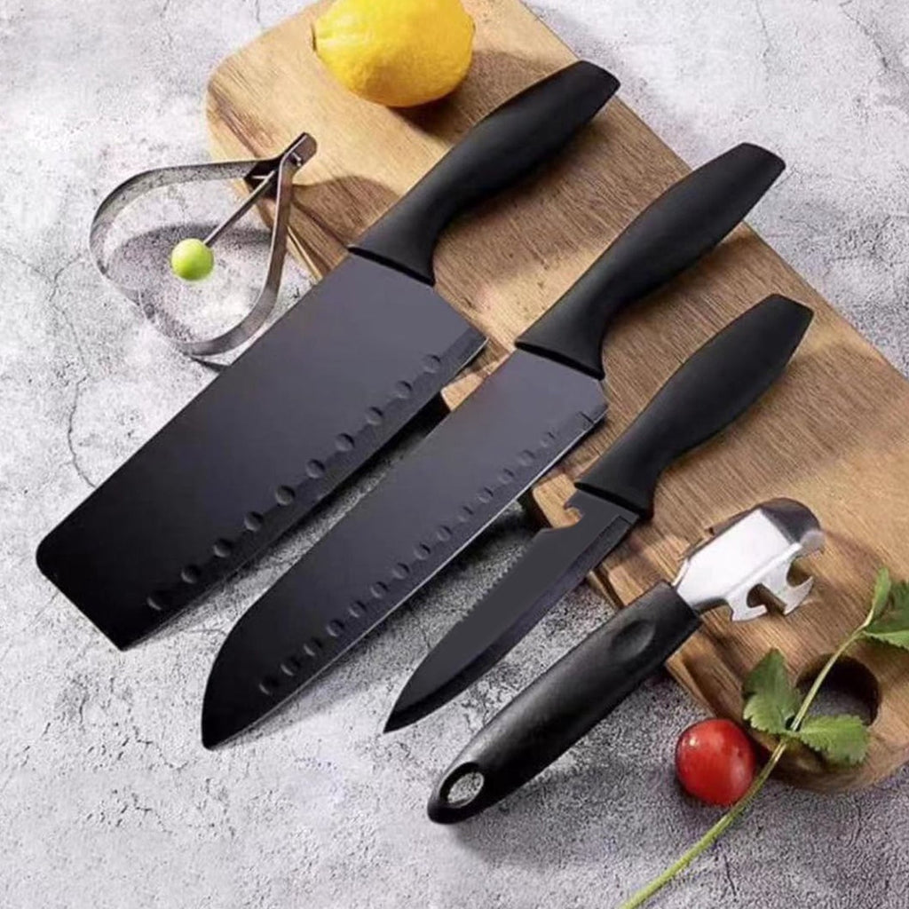 All five knives, including the versatile chopping knife, neatly arranged.