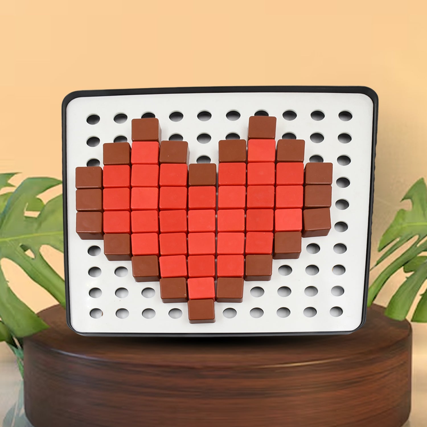 Arrangement of vibrant pixel cubes on the included base board.