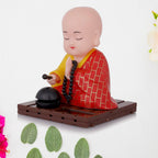 The moving Solar Buddha Statue displayed in a home setting, adding tranquility.