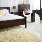 Square furniture pad effectively preventing scratches on a wooden floor.