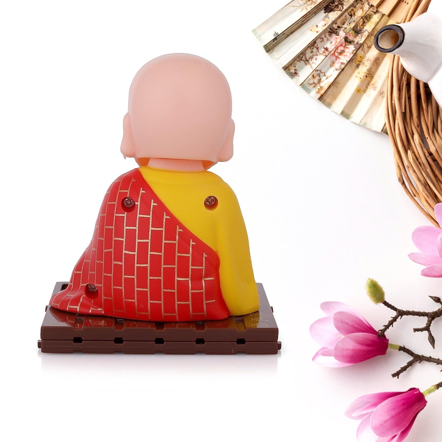 Back view of the Solar Buddha Statue, revealing the solar power mechanism.