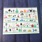 Set of 4 kids placemats in various colorful cartoon designs