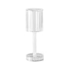 Contemporary crystal lamp illuminating a living room space with its unique design.