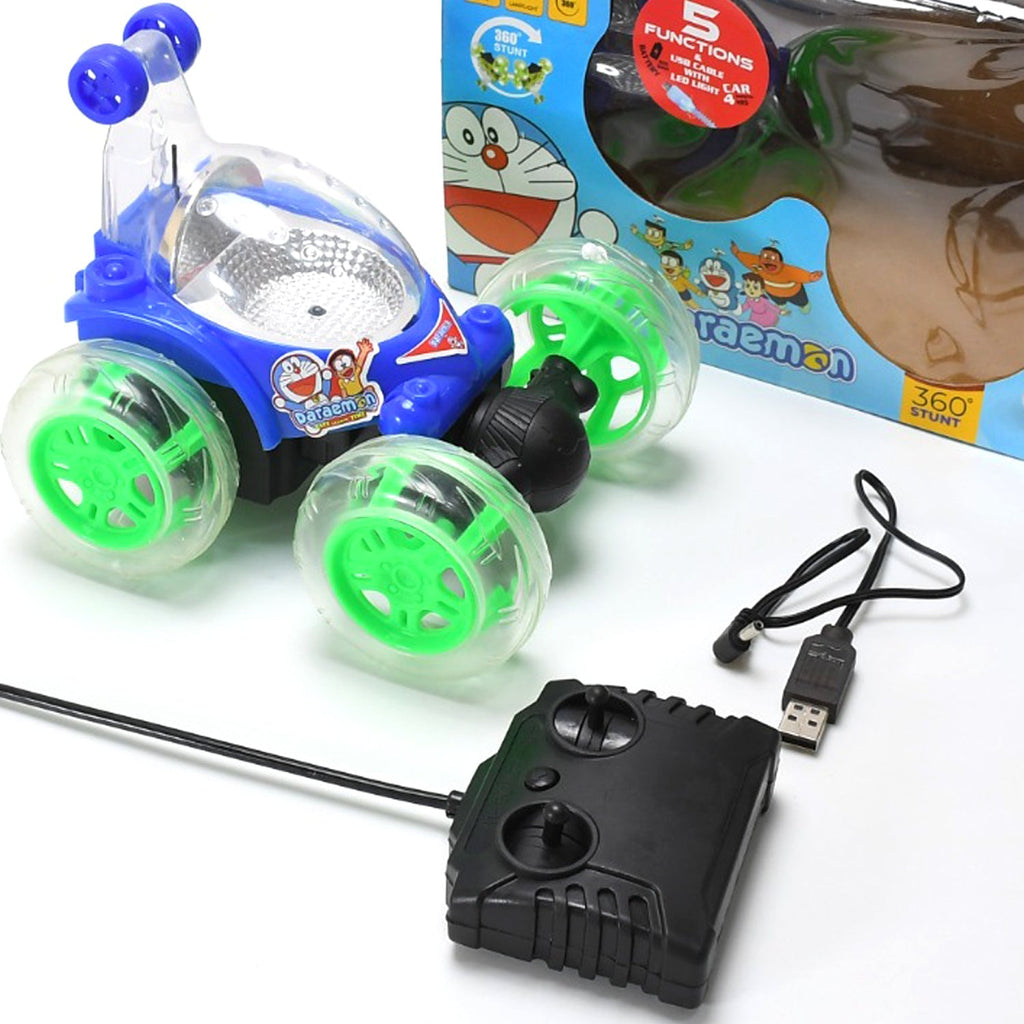 A red and blue Stunt Remote Control Car performing a trick with bright 3D lights.