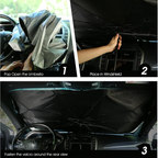 Close-up of the robust handle and mechanism of the windshield umbrella for car.