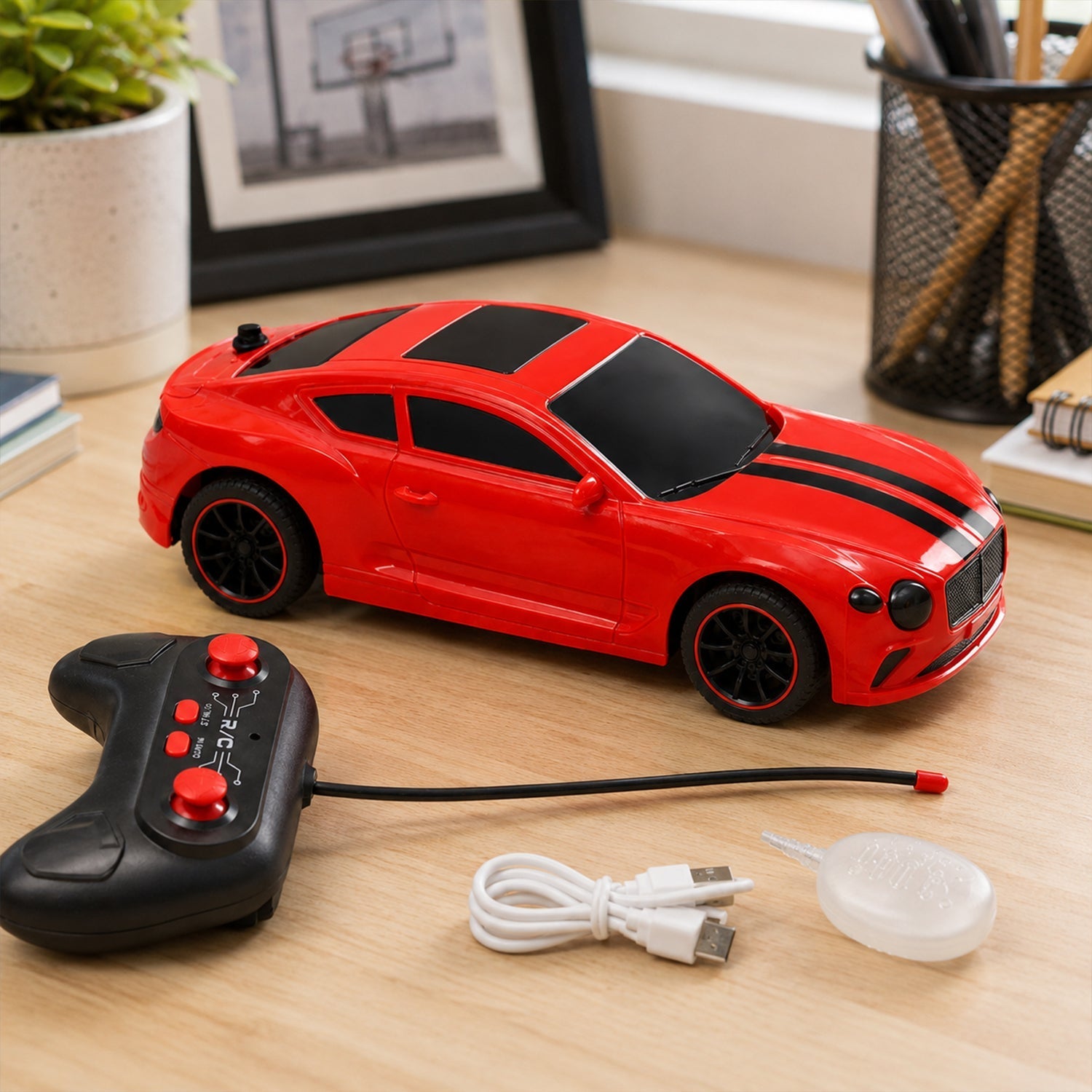 Child playing with high-speed remote control sports car with bright lights