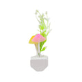 Color-changing LED mushroom night light illuminating a cozy room.