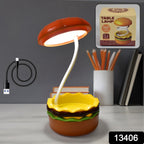 Child studying with the flexible burger LED night lamp on a desk.