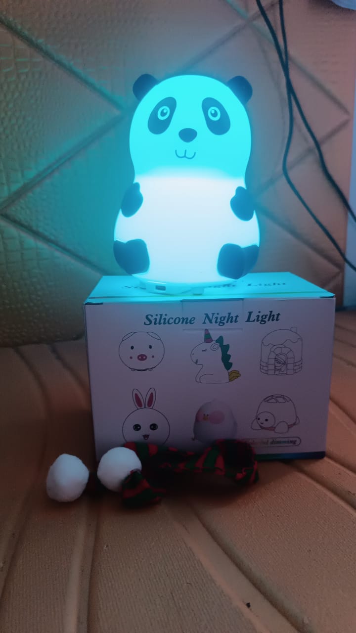 Lifestyle shot of the panda night light enhancing a child-friendly space.