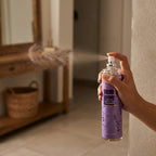 Close-up of lavender air freshener spray bottle for rooms and cars