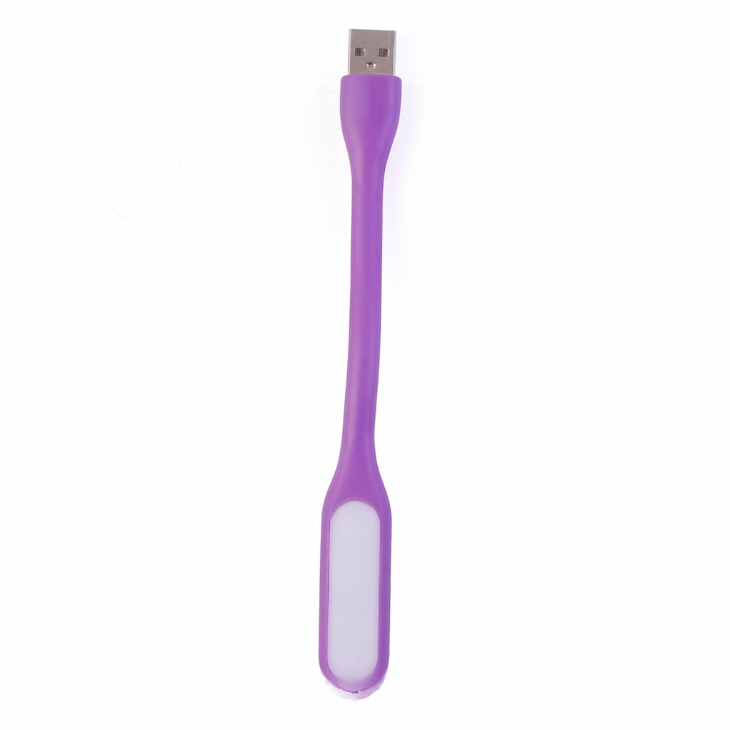 Purple USB-powered LED light effectively illuminating a compact workspace.