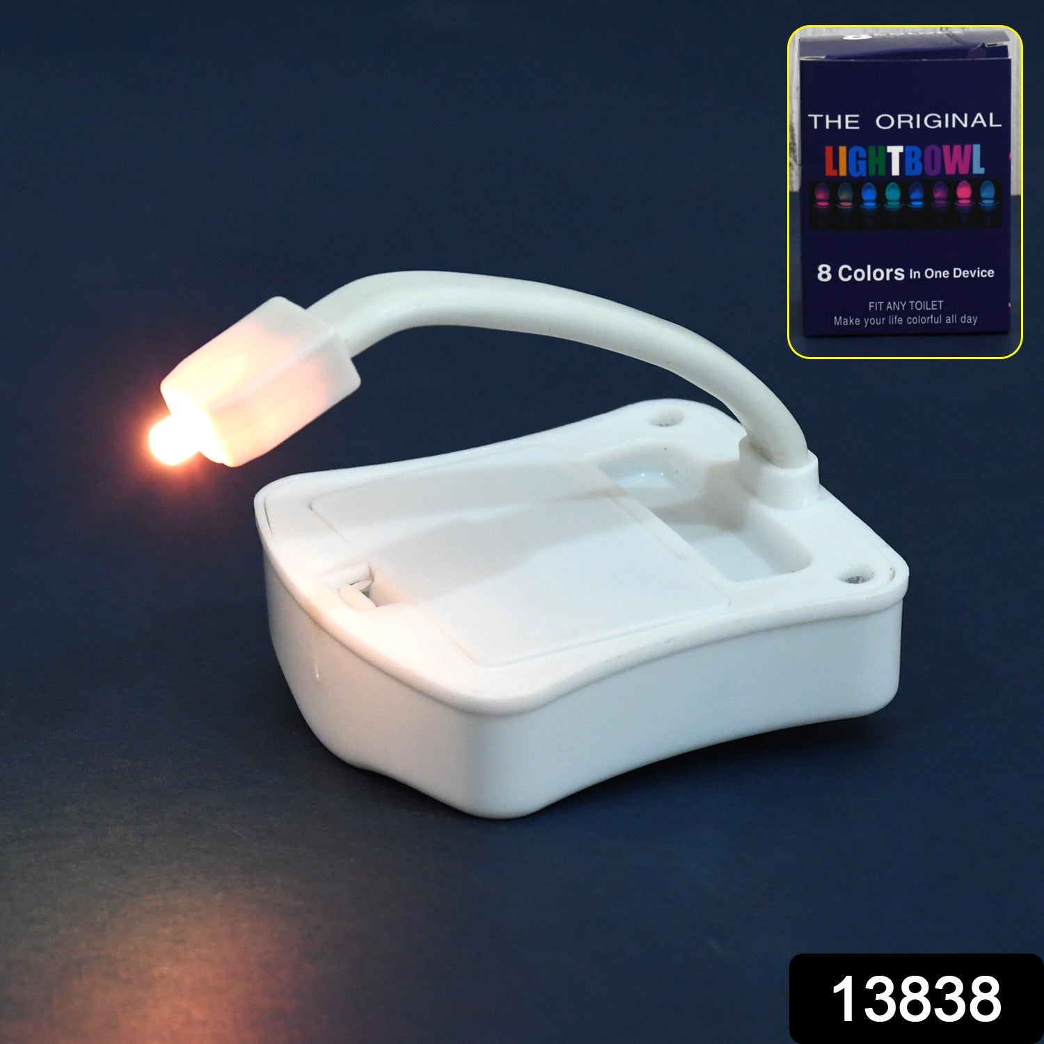 Close-up of the easy-to-install LED toilet night light attached to a toilet rim.